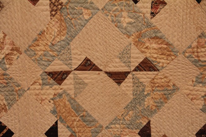 detail of hand quilting on quilt from the 1800's